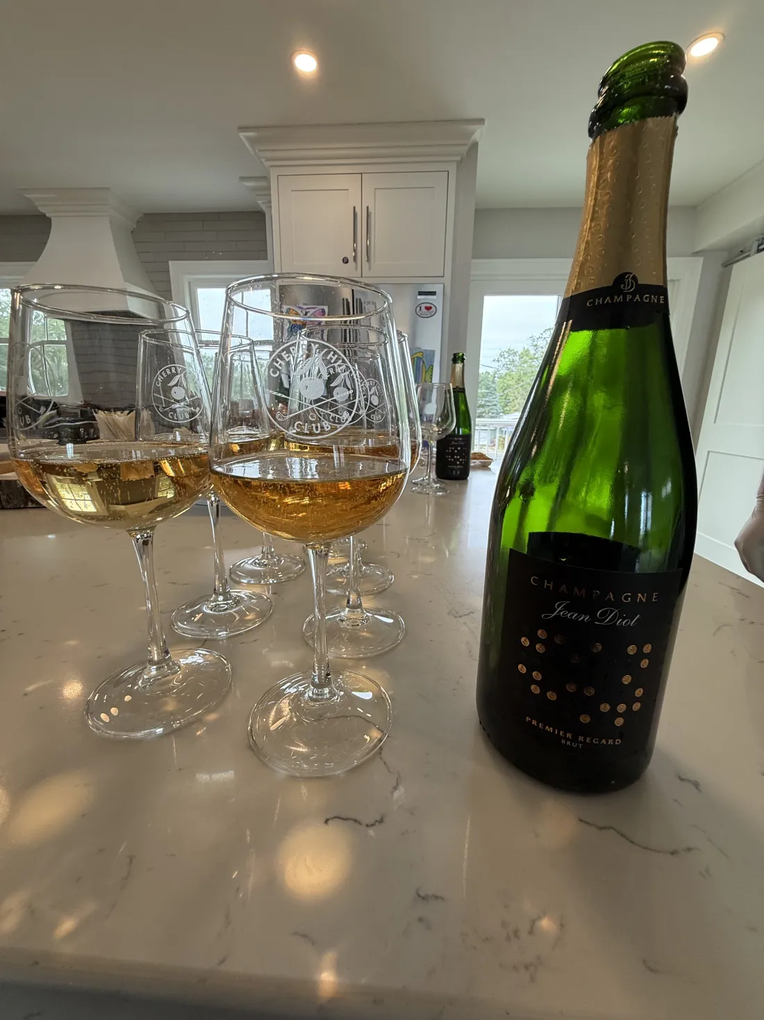 Champagne and glasses set out for a celebration