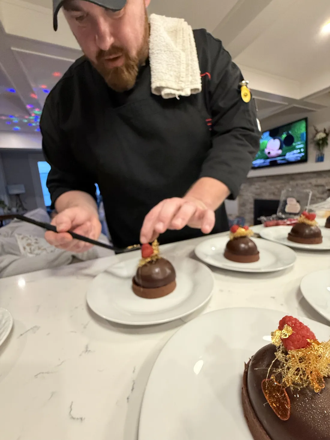 Chef Michael plating desserts