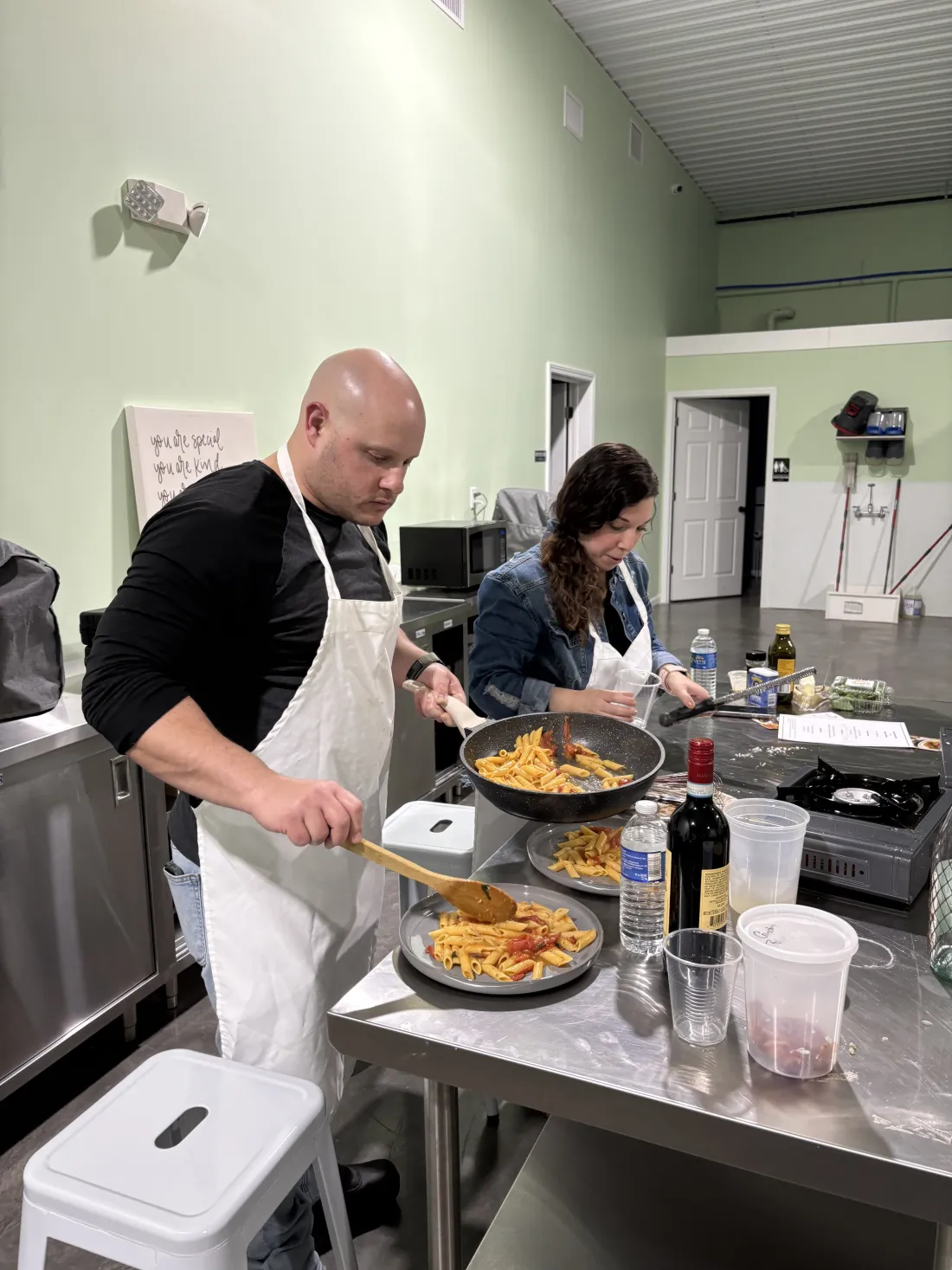 Chef Michael teaching at a home stove