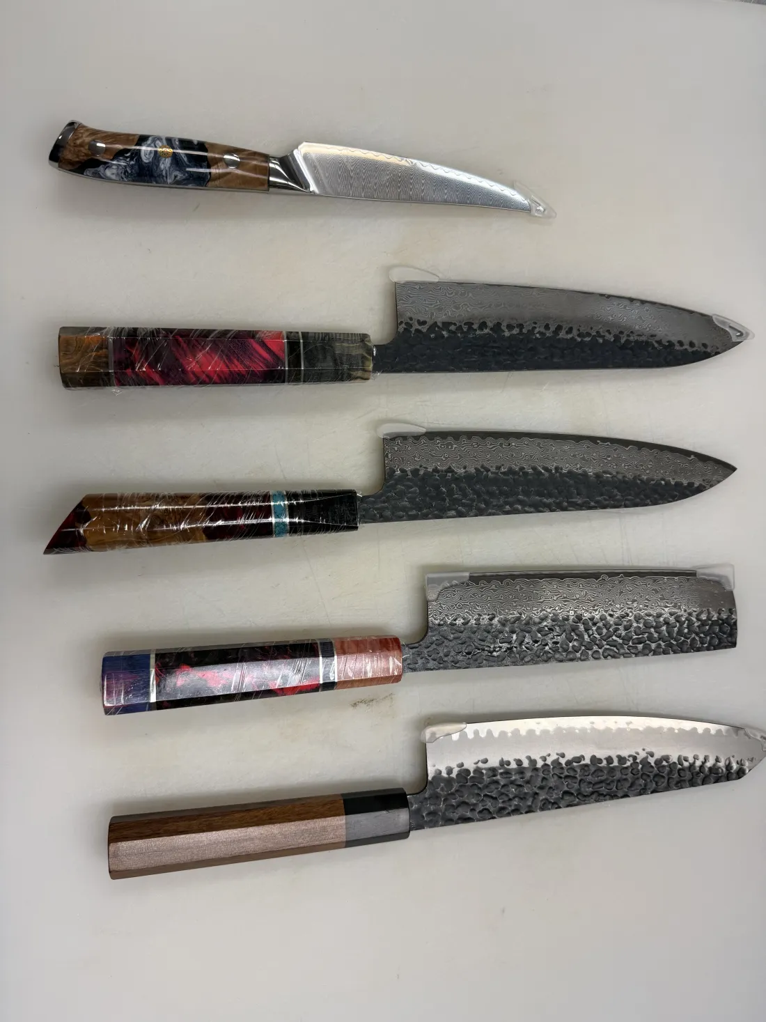 A set of Damascus steel chef knives