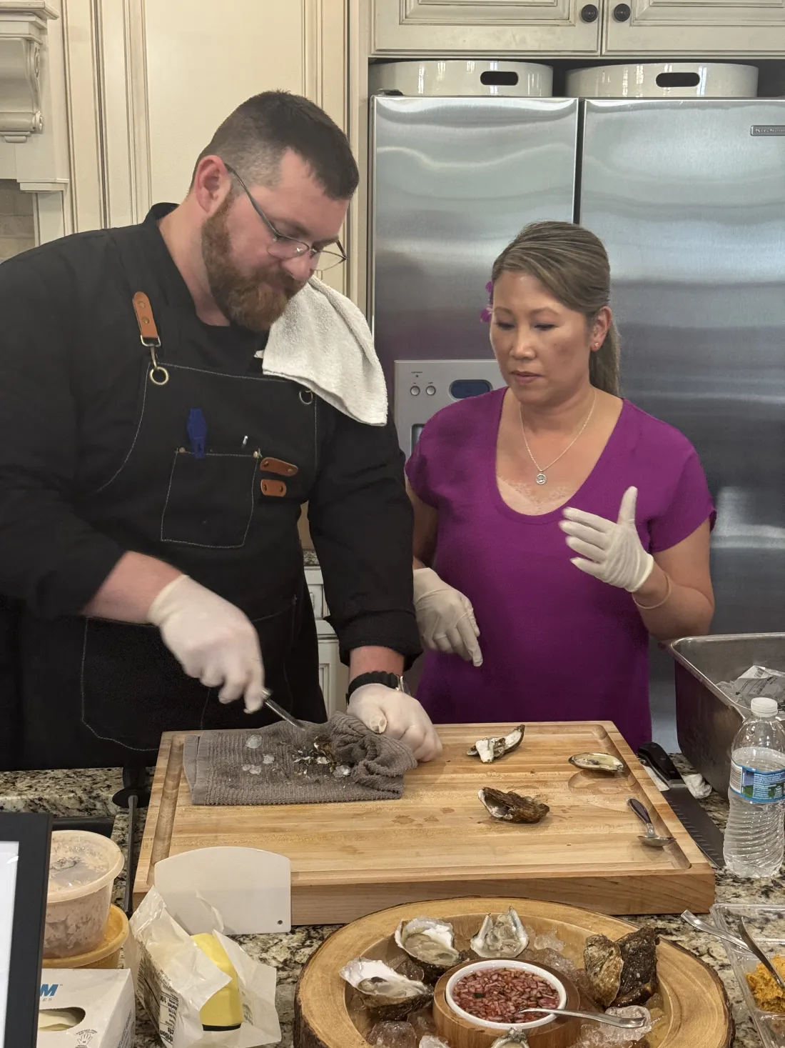Chef Michael teaching a student at the kitchen counter