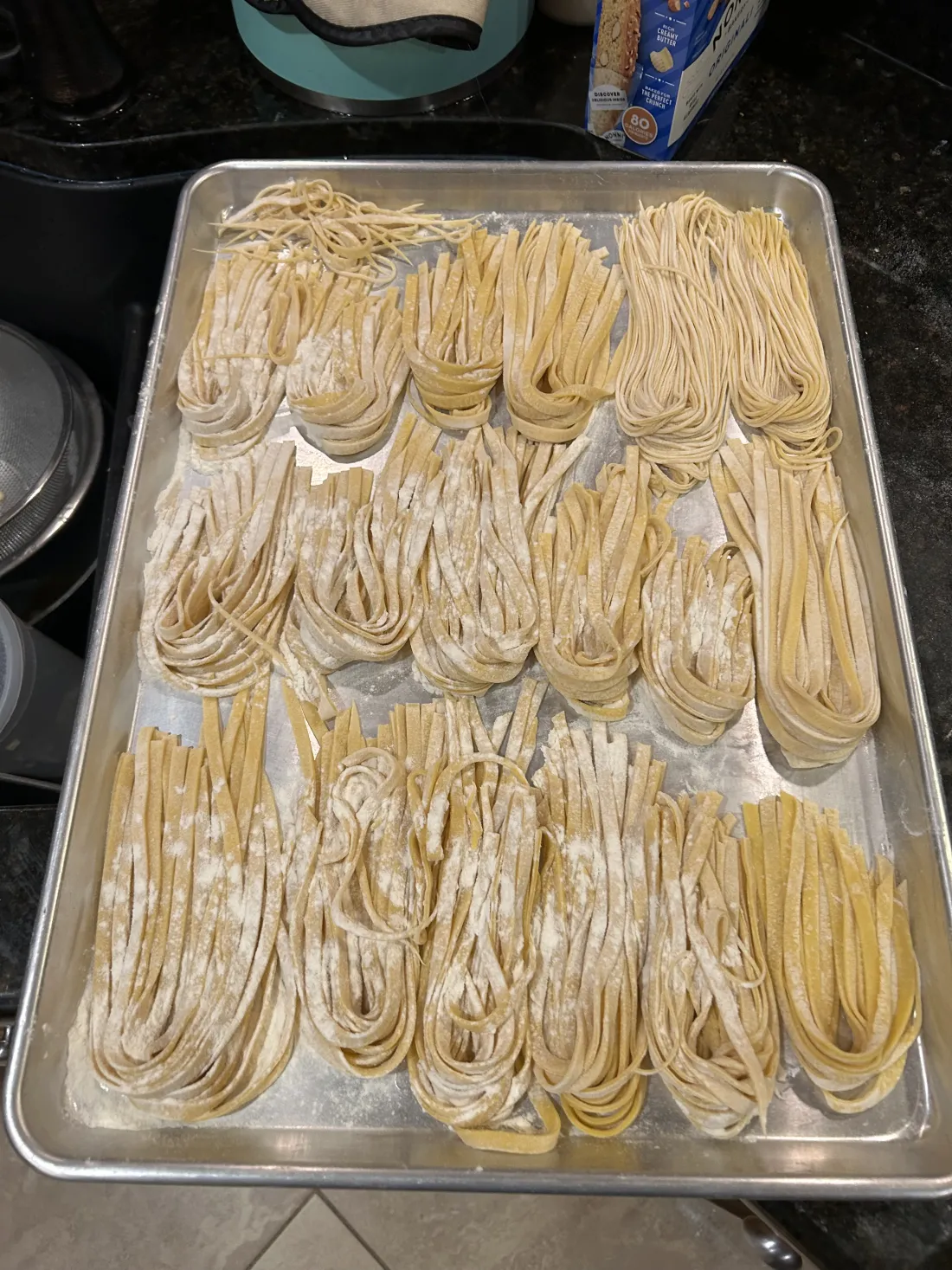 A tray of fresh hand-made pasta nests