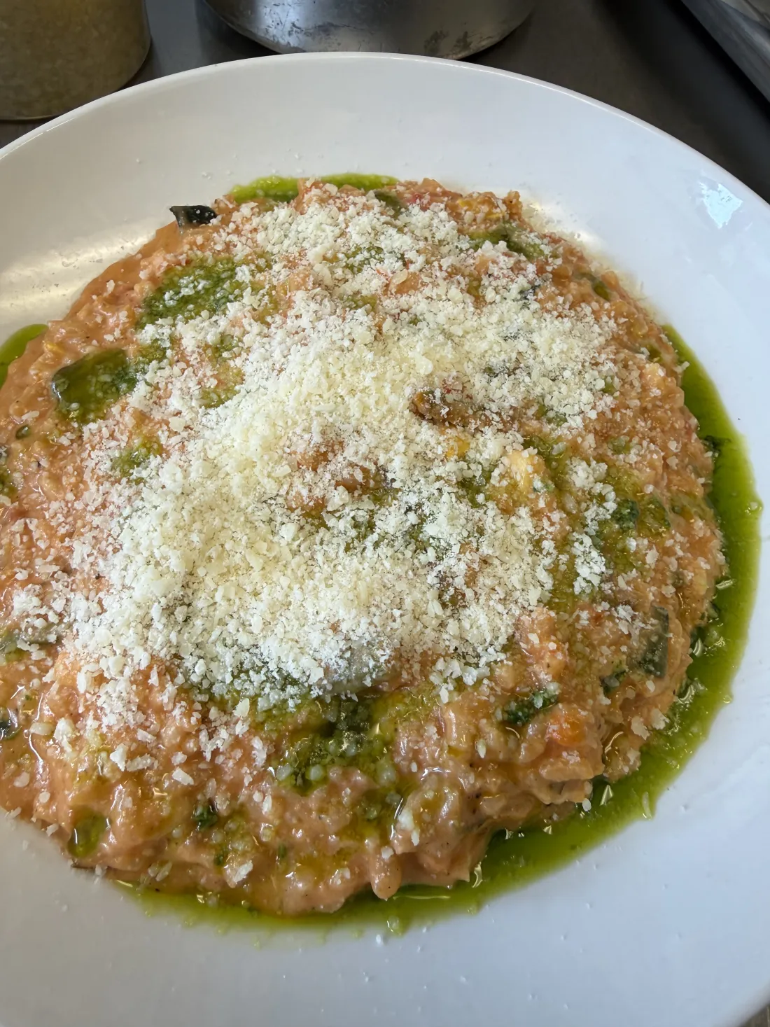 Risotto &mdash; Finished with green oil and fresh cheese